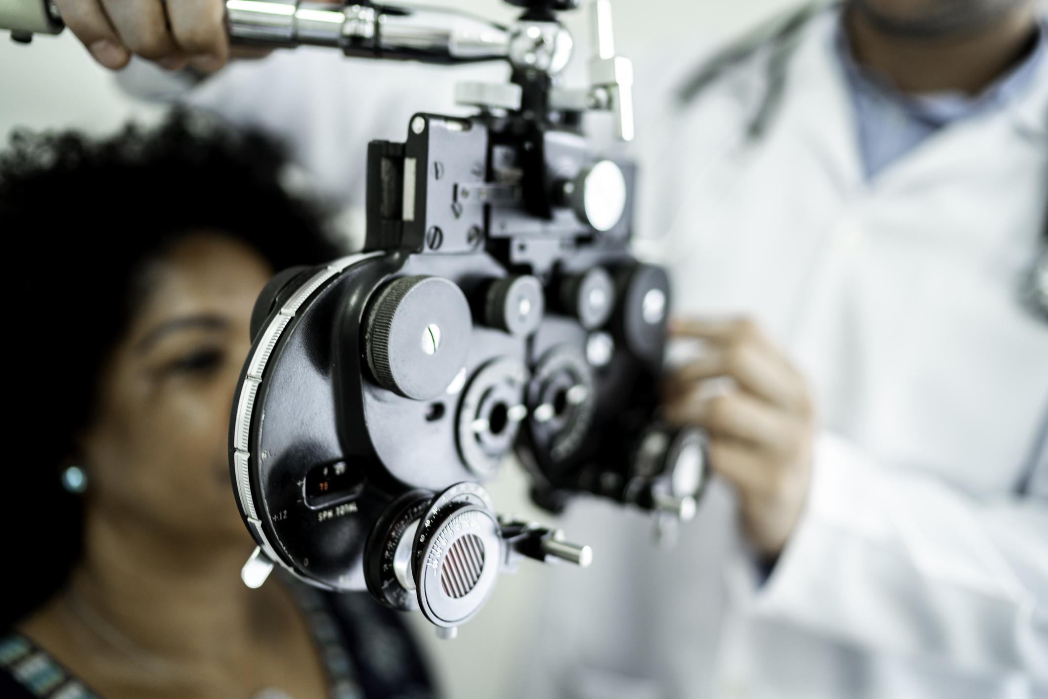 a woman getting an eye exam